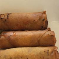 Veggie Lumpia · 8  fried spring rolls stuffed with fresh seasoned mixed veggies served with sweet chili sauce