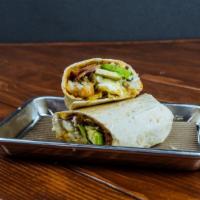 Breakfast Burrito  · Sausage or bacon, egg, tater
Tots,guacamole, cheddar cheese,
and crema.