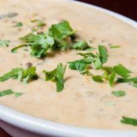 Daal Makhani · Mixed lentils & red kidney beans cooked in thick creamy sauce.
