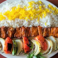 Shish Kabob · Thick chunks of filet mignons with onions, bell peppers, tomatoes, served with basmati rice.