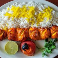 Boneless Chicken Kabob · Delicious marinated charbroiled, boneless breast and leg of chicken sauce served with steam ...