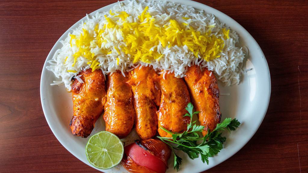 Chicken Barg · Thick slice of charbroiled chicken breast, marinated with our special sauce, served with basmati rice and charbroiled tomato.