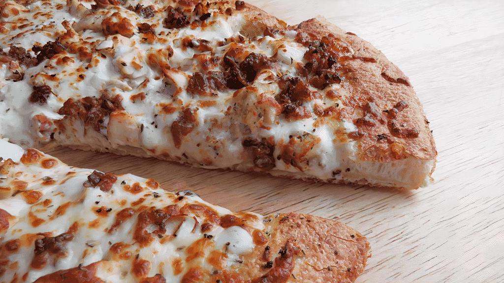 Chicken Bacon Ranch Pizza · Chicken, Real Bacon, Onions on a Ranch Sauced Pizza