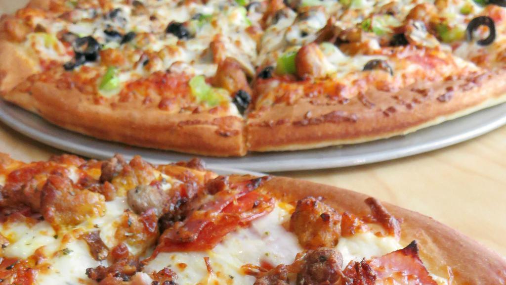 Choose Two Medium Favorites · Pick any two medium favorites pizza for just $29.99.  Choose between the Westside, Big Kahuna, Tropical Heat, Meat Mania, Veggie, Chicken Bacon Ranch, Garlic Chicken, BBQ Chicken, and Gourmet Veggie.