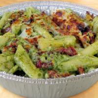 Penne Creamy Pesto · Creamy Pesto, Sun-Dried Tomatoes, Artichoke Hearts, Parmesan & Garlic