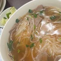 Beef Noodle & Rare Steak Meat In Hot Soup · 