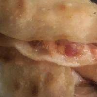 Gobernador Taco · Shrimp, pico de gallo, melted cheese, and hard shell tortilla.