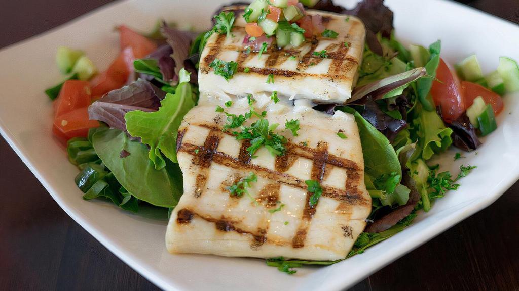 Grilled Mahi Salad · Mixed greens, tomatoes, cucumbers, red onions, fire roasted corn and dressing on the side.