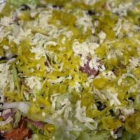 Antipasta Salad · Tossed green salad, mozzarella cheese, onions, olives, salami, Canadian bacon, pepperoni, pe...