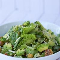 Caesar Salad · Baby spinach, romaine hearts, croutons, chopped tomatoes, avocado, roasted pepitas, Parmesan...