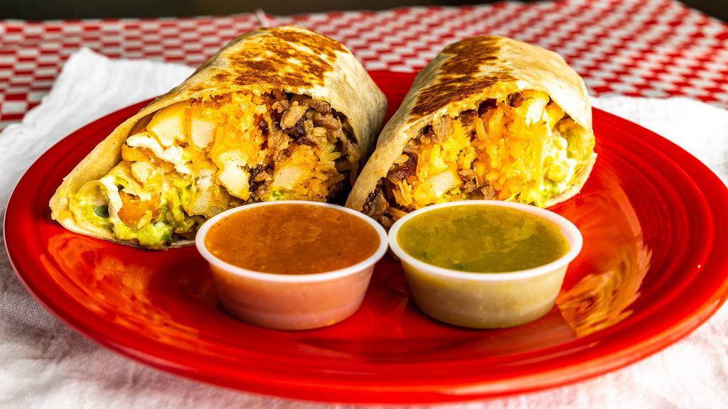 Cali Burrito · Served with choice of meat, french fries, rice, cheddar cheese, sour cream, guacamole, salsa.