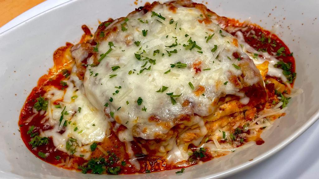 Meat Lasagna · Layers of noodles, ground beef, ricotta cheese and meat sauce topped with mozzarella cheese.