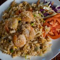 Thai Fried Rice · Fried rice with eggs, tomatoes, onions with a choice of pork, chicken, beef, or vegetarian.