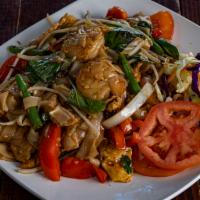 Drunken Noodles - Pad Kee Mao · Spicy. Spicy flat noodles with green onions, onions, chilies, garlic, and Thai basil.