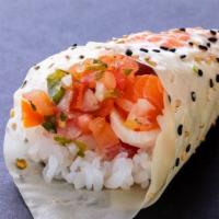 Sashimi Ceviche Hand Roll · Assorted sashimi served ceviche style in a hand roll wrapped in soy paper.