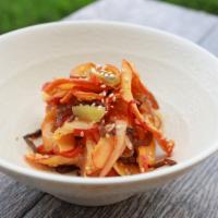 Squid Salad · Japanese Calamari Salad. Wood Ear Mushrooms, Ginger, Bamboo Shoots.