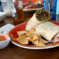 Bean Cheese Burrito · Black beans, Mexican red rice, and cheese wrapped in a flour tortilla.
