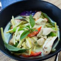 #702. Green Curry · Coconut milk, eggplants, bamboo shoots, bell pepper, basil leaves and meat of your choice co...