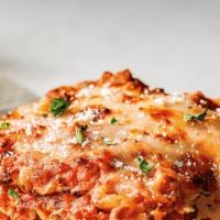 Meat Lasagna · Served with side of garlic bread.