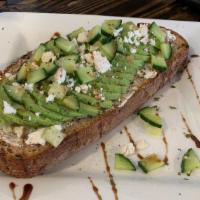 Avocado Toast · Multigrain toast, cream cheese, sliced avocado, cucumber, feta cheese, house sauce