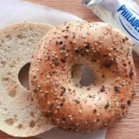 Bagel · Toasted bagel with cream cheese on side