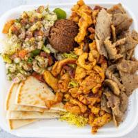 Paradise Combo Platter · Mixed lamb, beef, and chicken. Includes yellow rice, pita bread, one falafel, salad, tahini ...