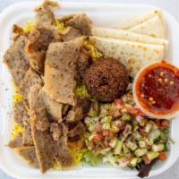 Mixed Lamb & Beef Gyro Platter · Includes yellow rice, pita bread, one falafel, salad, tahini sauce, and our signature garlic...