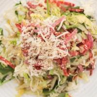 Chopped Salad · Tricolor greens, salami, fontina cheese, garbanzos, cherry tomatoes, pepperoncini, oregano v...