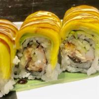 Mango Salmon Roll · Imitation crab, shrimp tempura, salmon, and mango sauce on top.