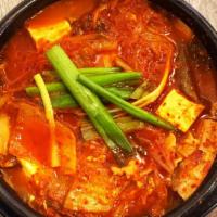 Kimchi Soup · Kimchi Soup with Pork belly. Side Dishes and white rice included