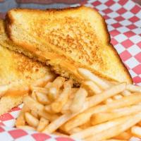 Grilled Cheese Plate · Melted cheddar and muenster grilled cheese, on thick Texas toast. Includes a side of French ...