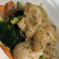 Pan Seared Filet Of Sole · served with garden Vegetables, potato Au Gratin, lemon 
capers sauce.