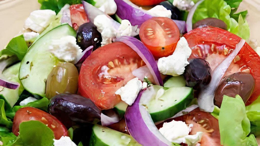 Greek Salad · Romaine lettuces, persian cucumbers, tomato,red onions, calamata olives, fetta cheese,lemon vinaigrette.