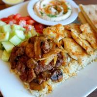 Meat Combo Plate · Choose a combination of any two meats. Served with salad, hummus, pita bread, and choice of ...