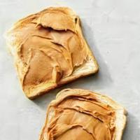 Peanut Butter Toast · Toast topped with peanut butter.