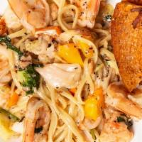 Lobster & Shrimp Linguine · Sautéed lobster, grilled shrimp, tomatoes, basil, fresh garlic, chopped tarragon with white ...