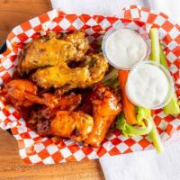 Chicken Wings · Buffalo, teriyaki, BBQ, spicy BBQ, mango habanero, garlic Parmesan.