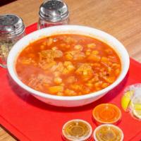 Menudo · Cow's Stomach In Broth (Base Red Chili pepper) W/ Hominy., Side Of  Flour Or Corn Tortilla ,...