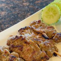 Thai Bbq Pork Skewer · grilled marinated pork on skewers, toasted rice mint lime sauce