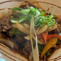 Mongolian Beef · Stir-fried beef with onion, carrot, and bell pepper in gravy sauce.