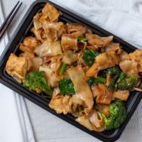 Pad See Ew · Wide rice noodles stir-fried with your choice of meat, broccoli, Chinese broccoli, egg, and ...