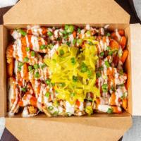 Chicken Loaded Fries · Breaded fried chicken fries with buffalo and ranch sauce topped with green onions and pepper...