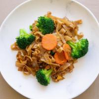See-Eyew Noodles · Pan fried flat noodles with egg, carrots and broccoli.