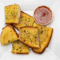 Garlic Bread · Homemade roll toasted with garlic herbs & parmesan cheese