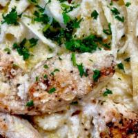 Pollo Alfredo · Chicken tenders and sun-dried tomatoes tossed in a creamy sauce over fettuccine.