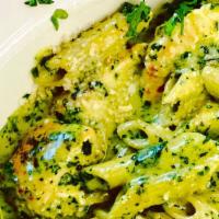 Chicken Penne Pesto · Chicken tenders and creamy pesto over penned past.