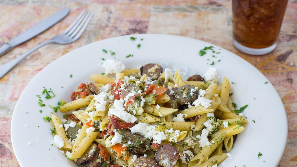 Penne Mediterranean · Choice of sausage, chicken. With feta, sun-dried tomatoes, fresh garlic, light pesto, olive oil and roasted bell peppers served over penne.