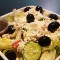 Greek Salad · Lettuce, tomatoes, cucumbers, olives, onions, feta cheese, famous special dressing.