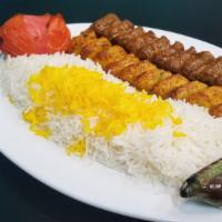 Combo Kabob · Beef and chicken louleh kabob, saffron rice, grilled tomato or hummus,pita bread