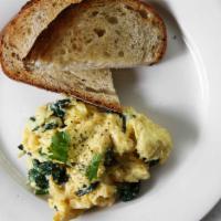 Ginger Spinach Scramble · 3 organic eggs, spinach, ginger, cotija cheese, cilantro and sesame seeds served with butter...